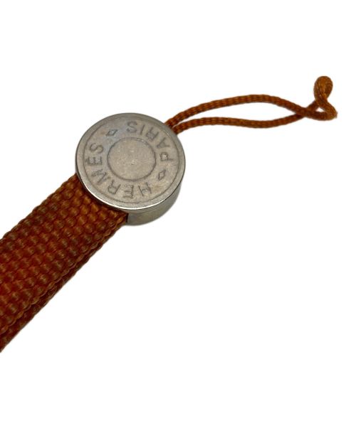 HERMES（エルメス）HERMES (エルメス) セリエストラップ オレンジ×シルバーの古着・服飾アイテム