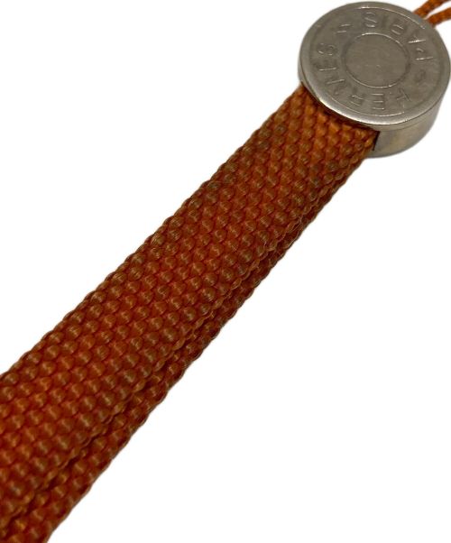 HERMES（エルメス）HERMES (エルメス) セリエストラップ オレンジ×シルバーの古着・服飾アイテム