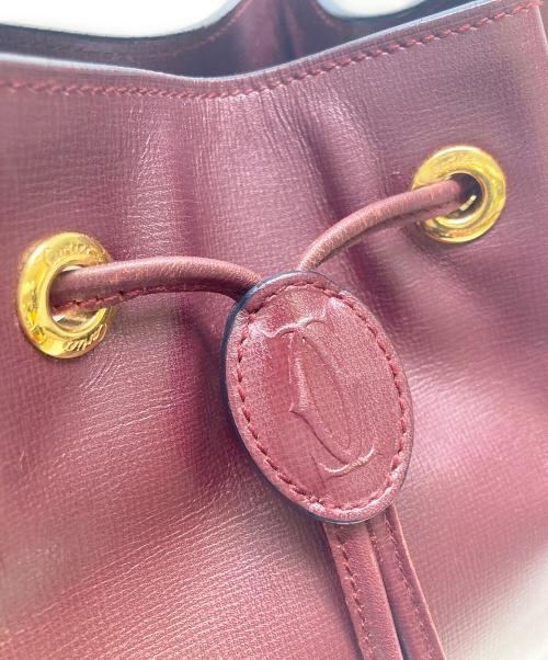 Cartier（カルティエ）Cartier (カルティエ) 巾着ショルダーバッグ マストライン ボルドーの古着・服飾アイテム