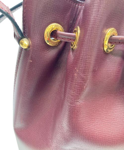 Cartier（カルティエ）Cartier (カルティエ) 巾着ショルダーバッグ マストライン ボルドーの古着・服飾アイテム