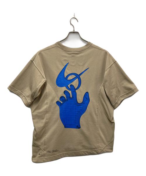 NIKE（ナイキ）NIKE (ナイキ) OFFWHITE (オフホワイト) NRG CL GRAFFITI S/S Tシャツ ベージュ サイズ:Lの古着・服飾アイテム