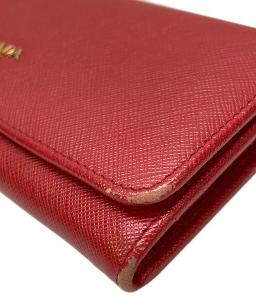 PRADA（プラダ）PRADA (プラダ) SAFFIANO METAL WALLET レッドの古着・服飾アイテム