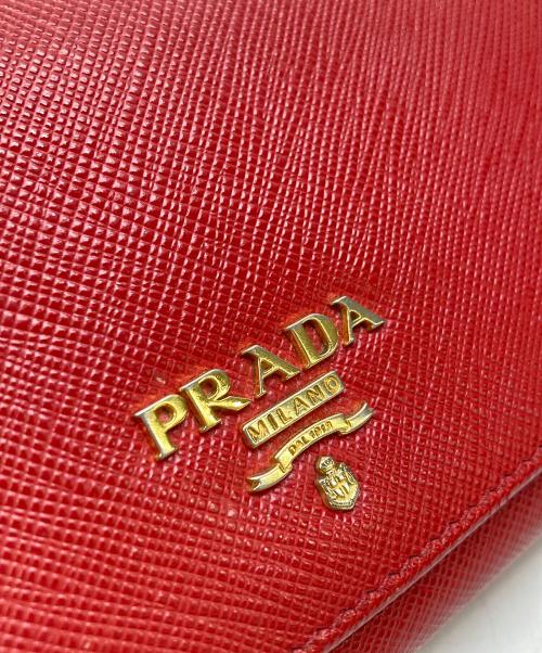 PRADA（プラダ）PRADA (プラダ) SAFFIANO METAL WALLET レッドの古着・服飾アイテム