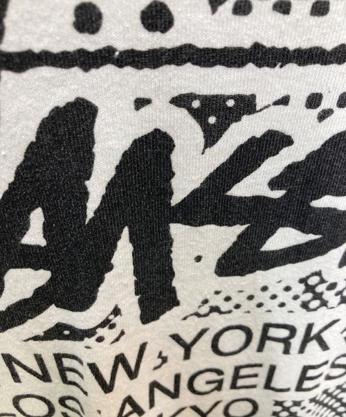stussy（ステューシー）stussy (ステューシー) WORLD TOUR TEE ホワイト×ブラック サイズ:Mの古着・服飾アイテム