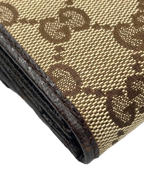 GUCCI（グッチ）GUCCI (グッチ) Wホック長財布 GGキャンバス ベージュ×ブラウンの古着・服飾アイテム