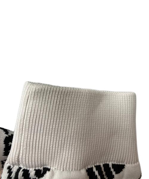 MUNSING WEAR（マンシングウェア）MUNSING WEAR (マンシングウェア) V12 (ヴィトゥエルブ) スウェット ホワイト×ブラック サイズ:SIZE　3Lの古着・服飾アイテム