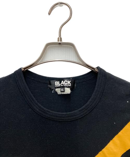 BLACK COMME des GARCONS（ブラックコムデギャルソン）BLACK COMME des GARCONS (ブラックコムデギャルソン) プリントTシャツ ブラック×イエロー サイズ:XLの古着・服飾アイテム