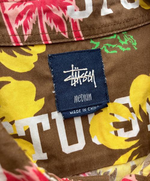 stussy（ステューシー）stussy (ステューシー) アロハデザイン半袖シャツ ブラウン サイズ:MEDIUMの古着・服飾アイテム