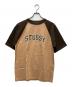 stussy（ステューシー）の古着「プリントTシャツ」｜ベージュ×ブラウン