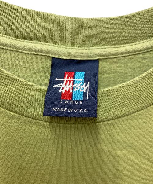 stussy（ステューシー）stussy (ステューシー) プリントTシャツ ロゴキュープグラフィック グリーン サイズ:LARGEの古着・服飾アイテム