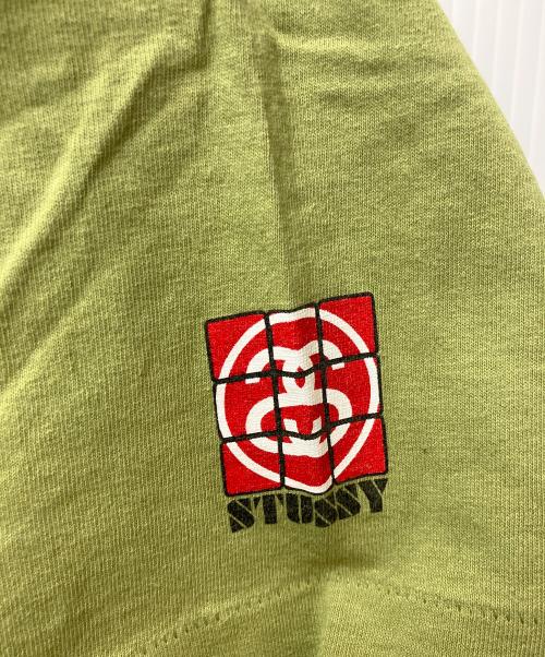 stussy（ステューシー）stussy (ステューシー) プリントTシャツ ロゴキュープグラフィック グリーン サイズ:LARGEの古着・服飾アイテム