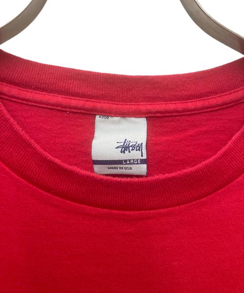 stussy（ステューシー）stussy (ステューシー) プリントTシャツ STUSSY INT.2 レッド サイズ:Largeの古着・服飾アイテム