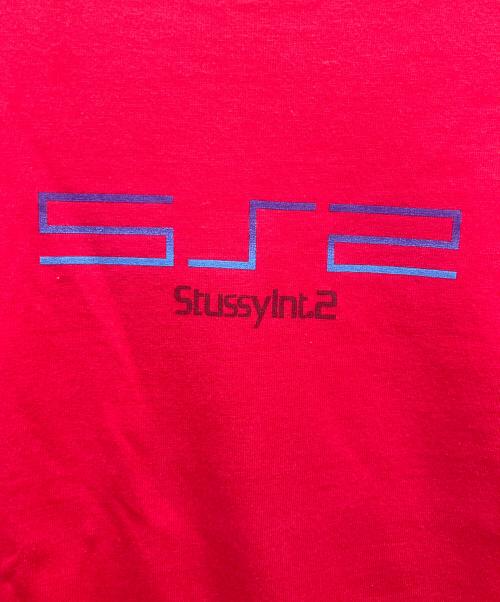 stussy（ステューシー）stussy (ステューシー) プリントTシャツ STUSSY INT.2 レッド サイズ:Largeの古着・服飾アイテム
