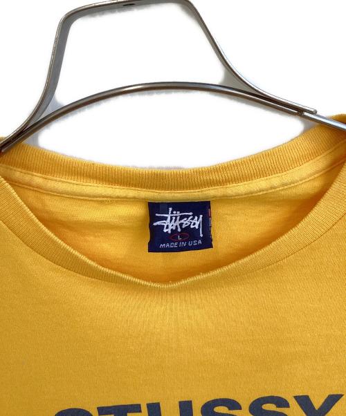 stussy（ステューシー）stussy (ステューシー) プリントTシャツ イエロー サイズ:SIZE Lの古着・服飾アイテム