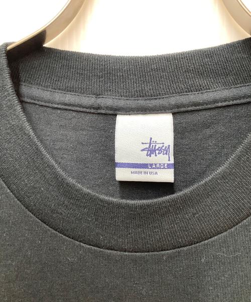stussy（ステューシー）stussy (ステューシー) プリントTシャツ ブラック サイズ:SIZE Lの古着・服飾アイテム