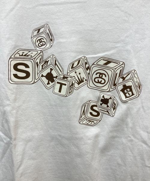 stussy（ステューシー）stussy (ステューシー) プリントTシャツ ロゴダイスプリント ホワイト サイズ:Mediumの古着・服飾アイテム