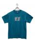 stussy（ステューシー）の古着「プリントTシャツ エアポートコード」｜ブルー