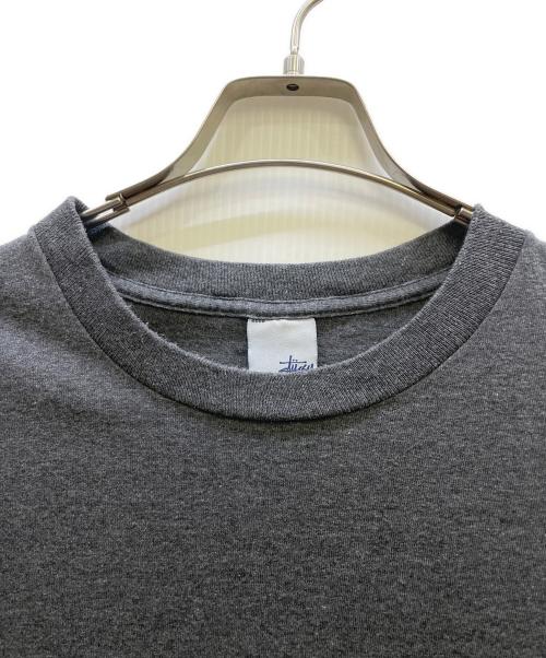 stussy（ステューシー）stussy (ステューシー) プリントTシャツ nyltraプリント グレー サイズ:Lの古着・服飾アイテム