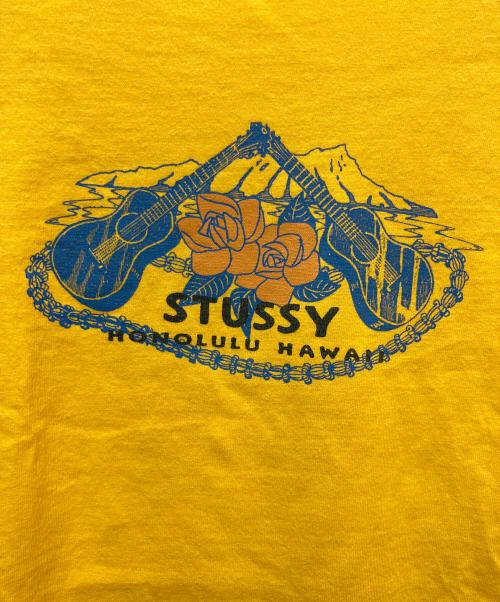 stussy（ステューシー）stussy (ステューシー) プリントTシャツ HONOLULU HAWAII イエロー サイズ:Lの古着・服飾アイテム