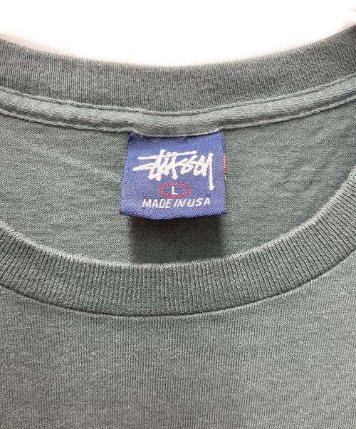 stussy（ステューシー）stussy (ステューシー) プリントTシャツ スタンプデザイン グレー サイズ:Lの古着・服飾アイテム