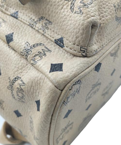 MCM（エムシーエム）MCM (エムシーエム) サイドスタッズリュック ベージュの古着・服飾アイテム