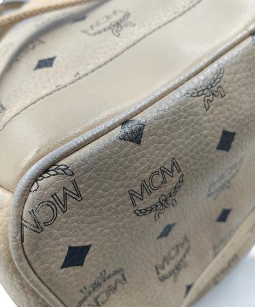 MCM（エムシーエム）MCM (エムシーエム) サイドスタッズリュック ベージュの古着・服飾アイテム