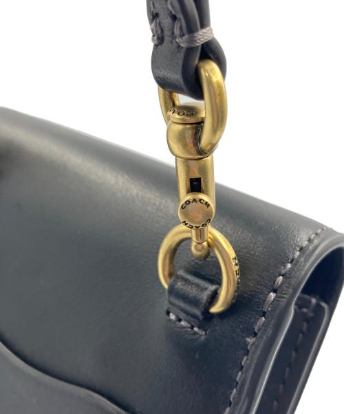 COACH（コーチ）COACH (コーチ) ターンロック フォーン クロスボディ・レキシー プリント ブラックの古着・服飾アイテム