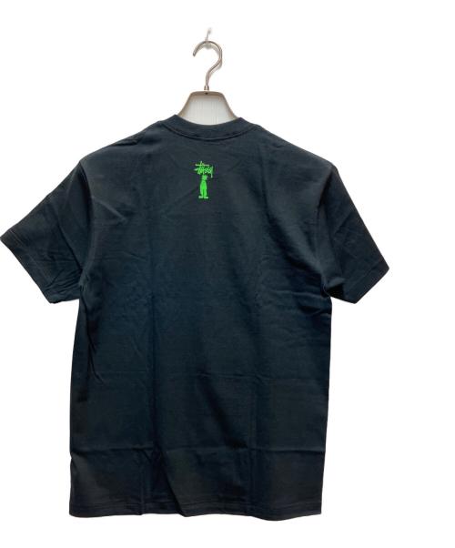 stussy（ステューシー）stussy (ステューシー) プリントTシャツ ブラック×グリーン サイズ:Mediumの古着・服飾アイテム