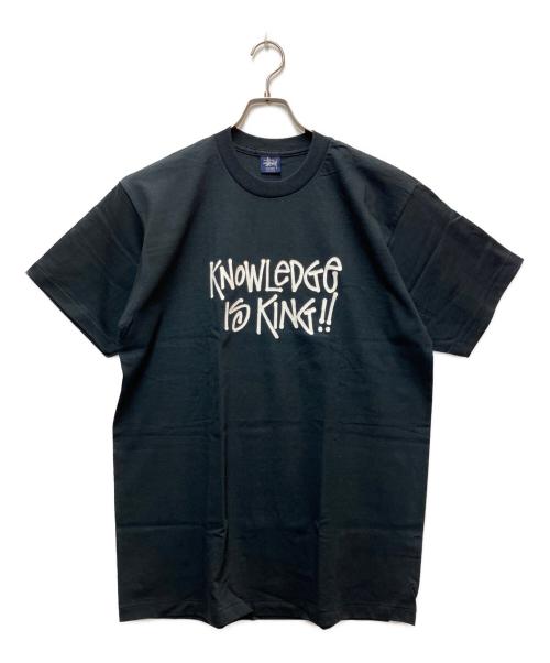 stussy（ステューシー）stussy (ステューシー) プリントTシャツ ブラック×ホワイト サイズ:Largeの古着・服飾アイテム