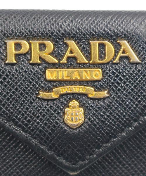 PRADA（プラダ）PRADA (プラダ) コンパクトウォレット SAFFIANO METAL ブラックの古着・服飾アイテム