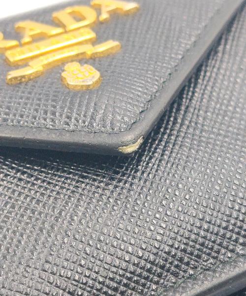 PRADA（プラダ）PRADA (プラダ) コンパクトウォレット SAFFIANO METAL ブラックの古着・服飾アイテム