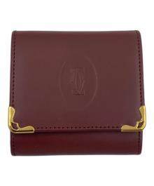 Cartier（カルティエ）の古着「コインケース マストライン」｜エンジ