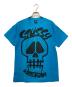 stussy（ステューシー）の古着「スカルプリントTシャツ」｜スカイブルー