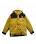 THE NORTH FACE（ザ ノース フェイス）の古着「マウンテンダウンジャケット」｜イエロー×ブラック