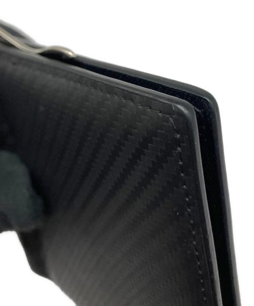 CORUNDUM（コランダム）CORUNDUM (コランダム) 2つ折り財布 ブラックの古着・服飾アイテム