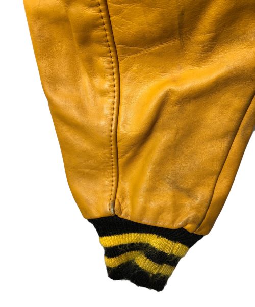 DeLong（デロング）DeLong (デロング) スタジャン ブラック×イエロー サイズ:SIZE40の古着・服飾アイテム