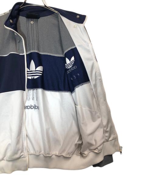 adidas（アディダス）adidas (アディダス) トラックジャケット グレー×ネイビー サイズ:US Mの古着・服飾アイテム