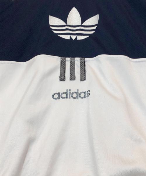 adidas（アディダス）adidas (アディダス) トラックジャケット グレー×ネイビー サイズ:US Mの古着・服飾アイテム