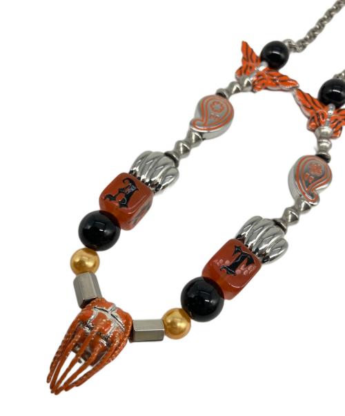 TYGA EVAE（エバー）TYGA EVAE (エバー) ネックレス シルバー×オレンジの古着・服飾アイテム