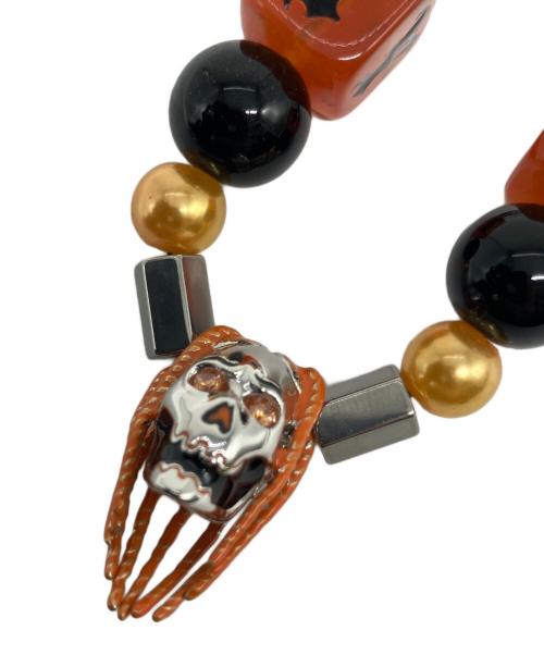 TYGA EVAE（エバー）TYGA EVAE (エバー) ネックレス シルバー×オレンジの古着・服飾アイテム