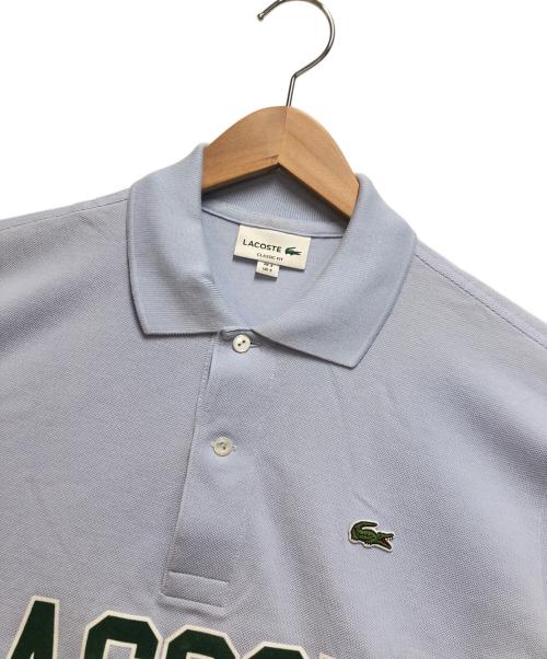 LACOSTE（ラコステ）LACOSTE (ラコステ) オーバーサイズネームプリントポロシャツ スカイブルー サイズ:FR 3　US Sの古着・服飾アイテム