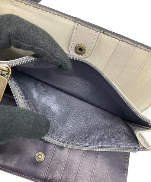 MOTHERHOUSE（マザーハウス）MOTHERHOUSE (マザーハウス) 2つ折り財布 パープルの古着・服飾アイテム