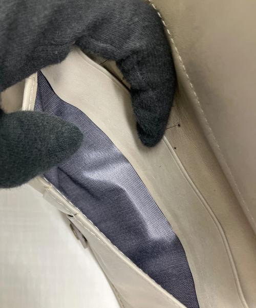 MOTHERHOUSE（マザーハウス）MOTHERHOUSE (マザーハウス) 2つ折り財布 パープルの古着・服飾アイテム