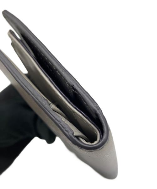 MOTHERHOUSE（マザーハウス）MOTHERHOUSE (マザーハウス) 2つ折り財布 パープルの古着・服飾アイテム