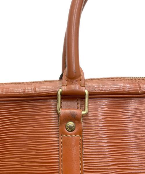 LOUIS VUITTON（ルイ ヴィトン）LOUIS VUITTON (ルイ ヴィトン) ポルト ドキュマン ヴォワヤージュ ブラウンの古着・服飾アイテム