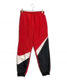 NIKE（ナイキ）の古着「ウーブンパンツ」｜ブラック×レッド