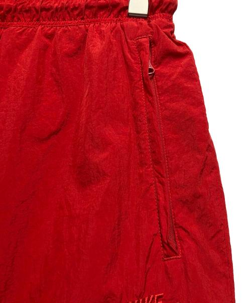 NIKE（ナイキ）NIKE (ナイキ) ウーブンパンツ ブラック×レッド サイズ:Mの古着・服飾アイテム