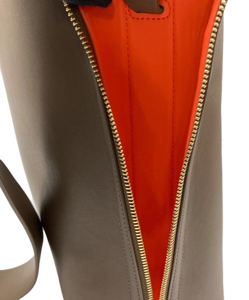 EPOR（エポール）EPOR (エポール) ショルダーバッグ ベージュ×オレンジの古着・服飾アイテム