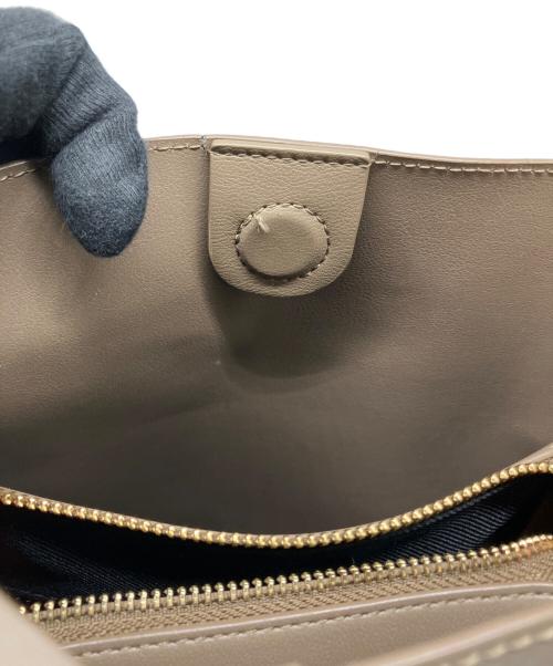 EPOR（エポール）EPOR (エポール) ショルダーバッグ ベージュ×オレンジの古着・服飾アイテム