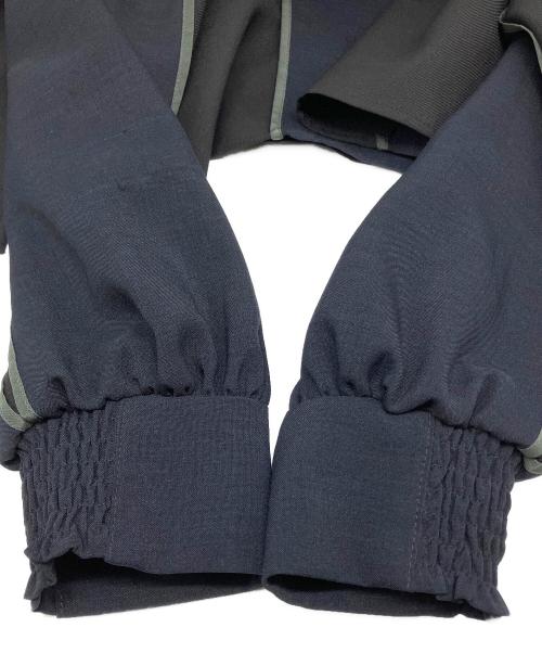 UNITED TOKYO（ユナイテッドトーキョー）UNITED TOKYO (ユナイテッドトーキョー) パイピングフレアブラウス ネイビー×ブラックの古着・服飾アイテム